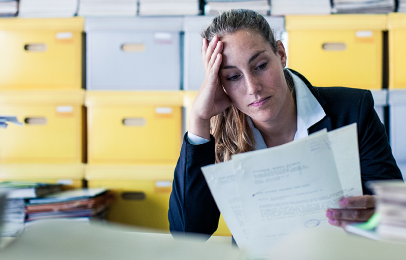 5thPort eConsent Software – Clinical Trails – Reduce Compliance Risk – Panel 2 5thPort eConsent software - Overwhelmed woman looking through litigations regarding non-compliance. 5thPort's eConsent software is compliant with FDA CFR 21 Part 11 to mitigate that.