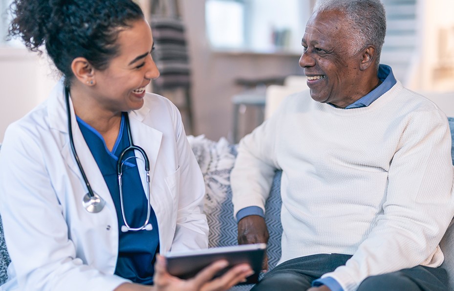 5thPort – Healthcare Better Patient Outcomes – Panel 2 Patient discussing treatment options with their doctor, using the 5thPort platform on an iPad. Digitally delivering patient centric experiences will increase health outcomes.