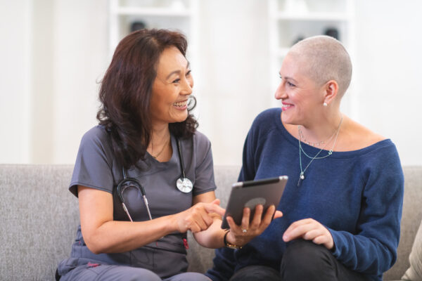 Doctor visits cancer patient Doctor visits cancer patient at her home
