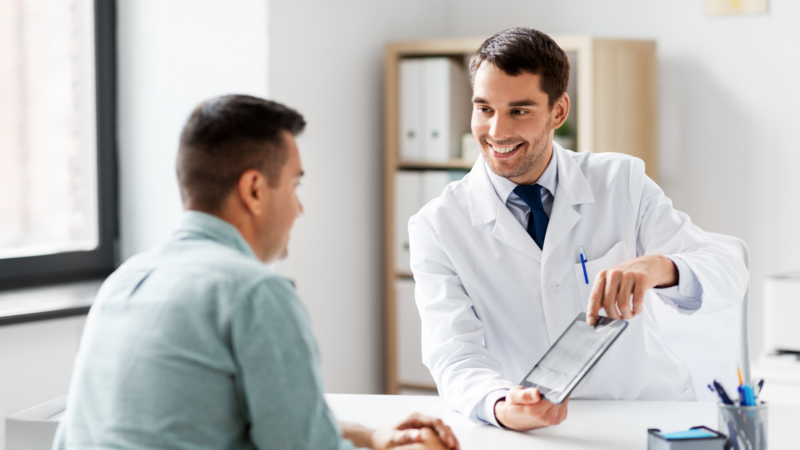 Doctor and patient with an ipad for electronic informed consent